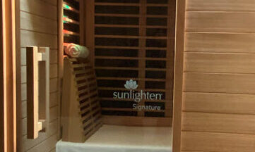 cropped-cropped-sauna-dark.jpg sunlighten far infrared sauna close-up to show panels and lights